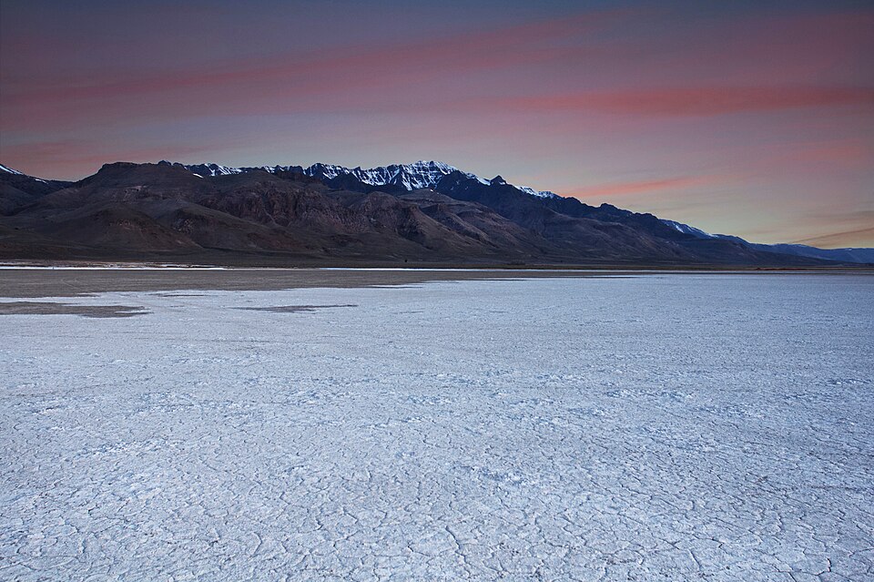 Steens Mountain rising over the Alvord desert in Oregon at dusk