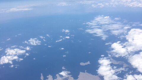 Aerial view of the Strait of Hormuz from an aircraft window