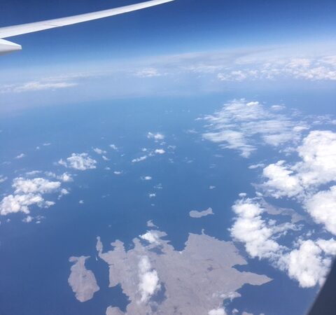 Aerial view of the Strait of Hormuz from an aircraft window
