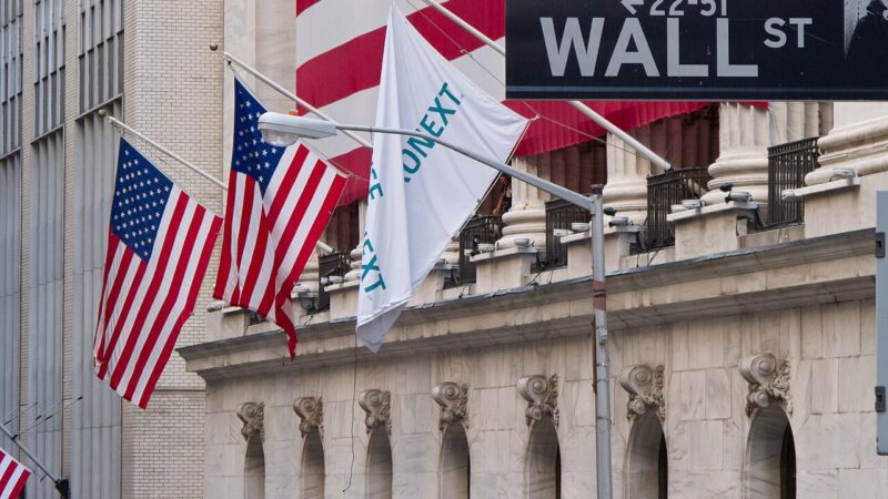 The Wall Street sign in front of the New York Stock Exchange